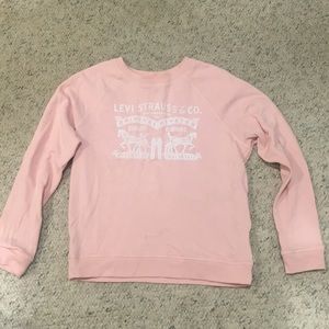Pink vintage-inspired Levi’s sweatshirt